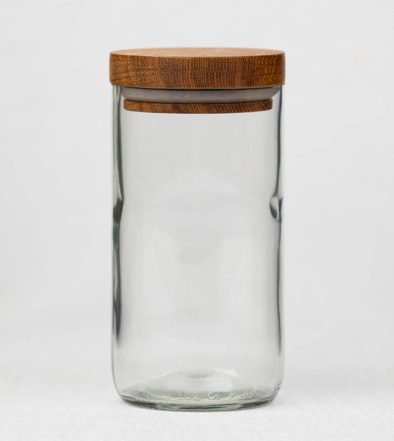 Vorratsglas mit Holzdeckel aus alten Weinflaschen